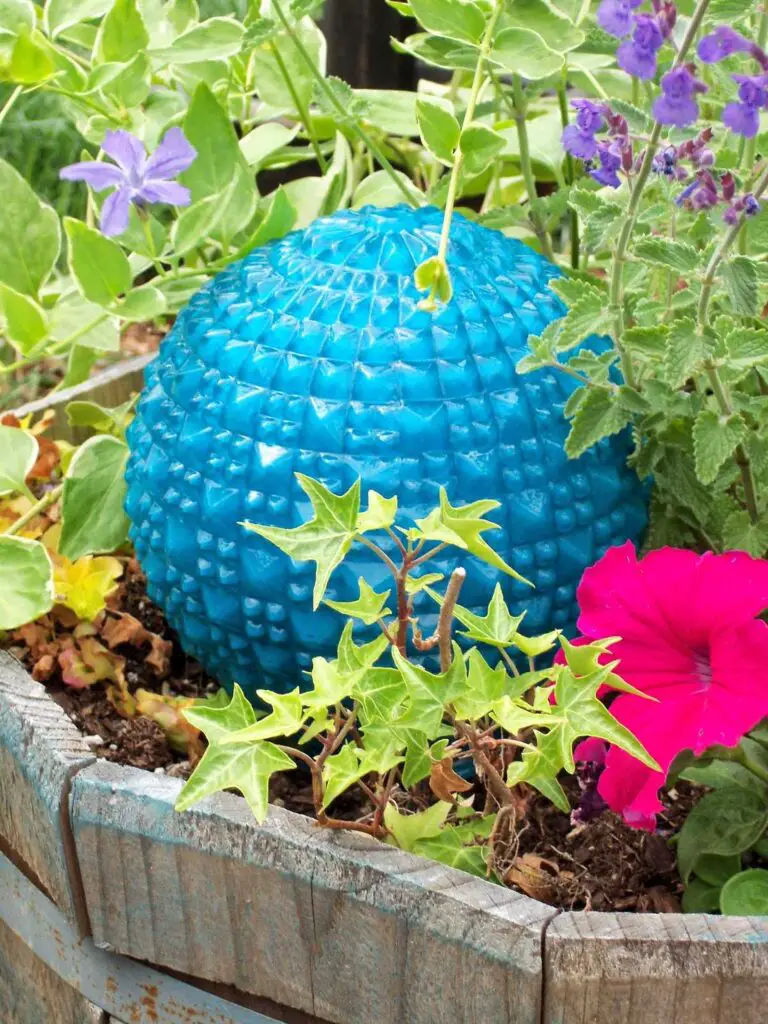 25 Unique DIY Garden Art Sculptures to Brighten Your Outdoor Space 19 25 Unique DIY Garden Art Sculptures to Brighten Your Outdoor Space 4