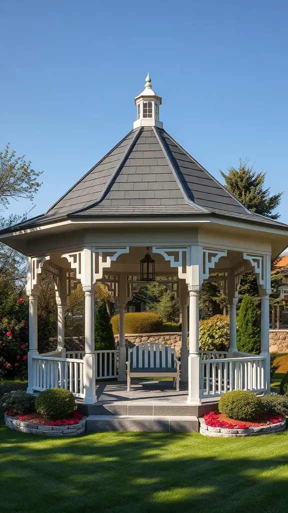 A beautiful pavilion with a gabled roof, surrounded by well-kept gardens and a green lawn.