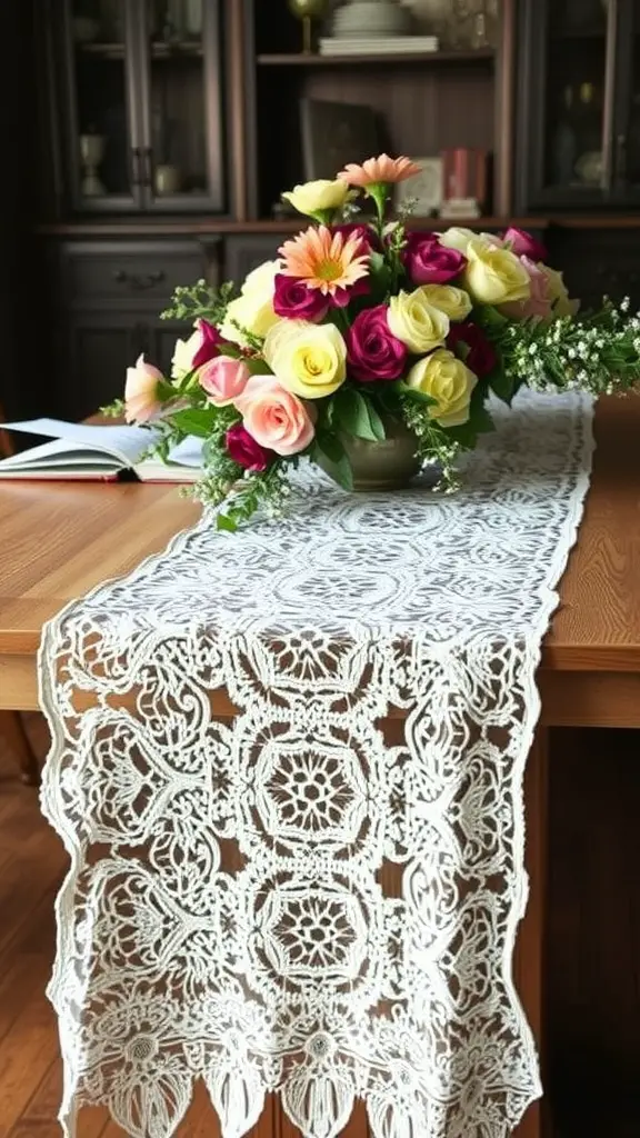 A vintage lace table runner on a wooden table, with a colorful bouquet of flowers in a vase.