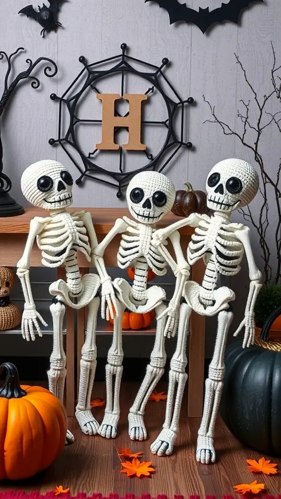 23+ Spooktacular Halloween Crochet Ideas You Need to Try 15 Three crochet skeletons with big eyes, surrounded by Halloween decorations like pumpkins and autumn leaves.