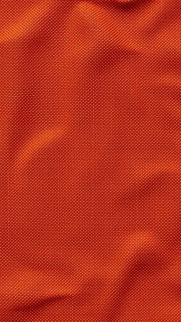 21+ Cozy Fall Mood Board Ideas for the Ultimate Autumn Vibe 10 Close-up of textured orange fabric