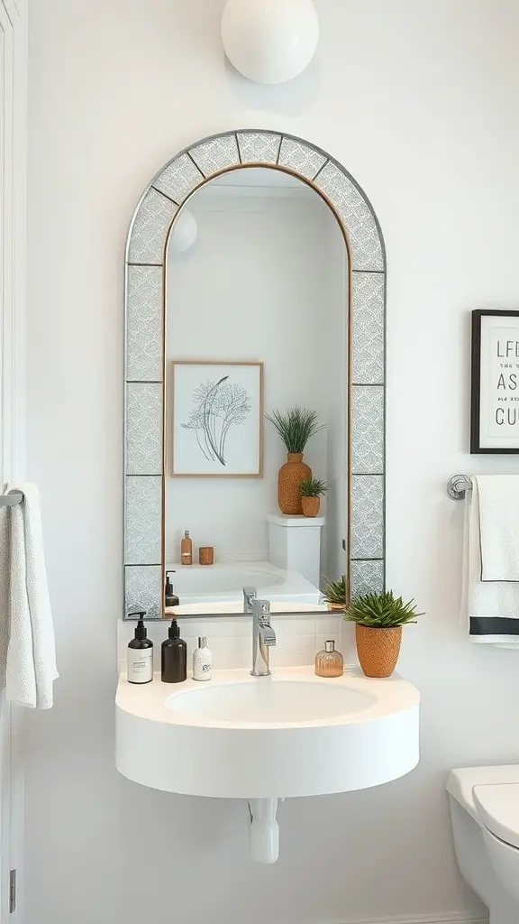A bathroom featuring an arched mirror with a textured frame, surrounded by decorative items and plants.