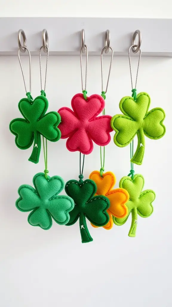 Colorful felt shamrock keychains hanging on a hook