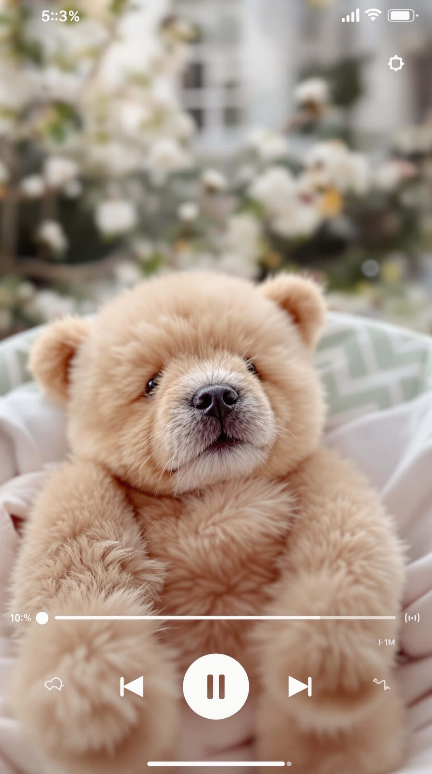 A cute baby animal with a soft and fluffy appearance, surrounded by nature.