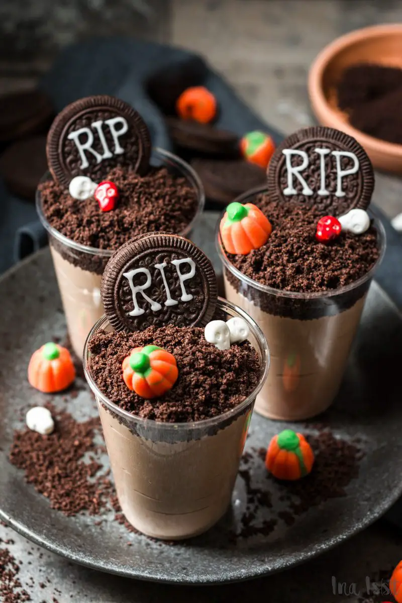 27 Halloween Treats for Kids and Adults That Everyone Will Love 4 Chocolate graveyard pudding cups with cookie tombstones