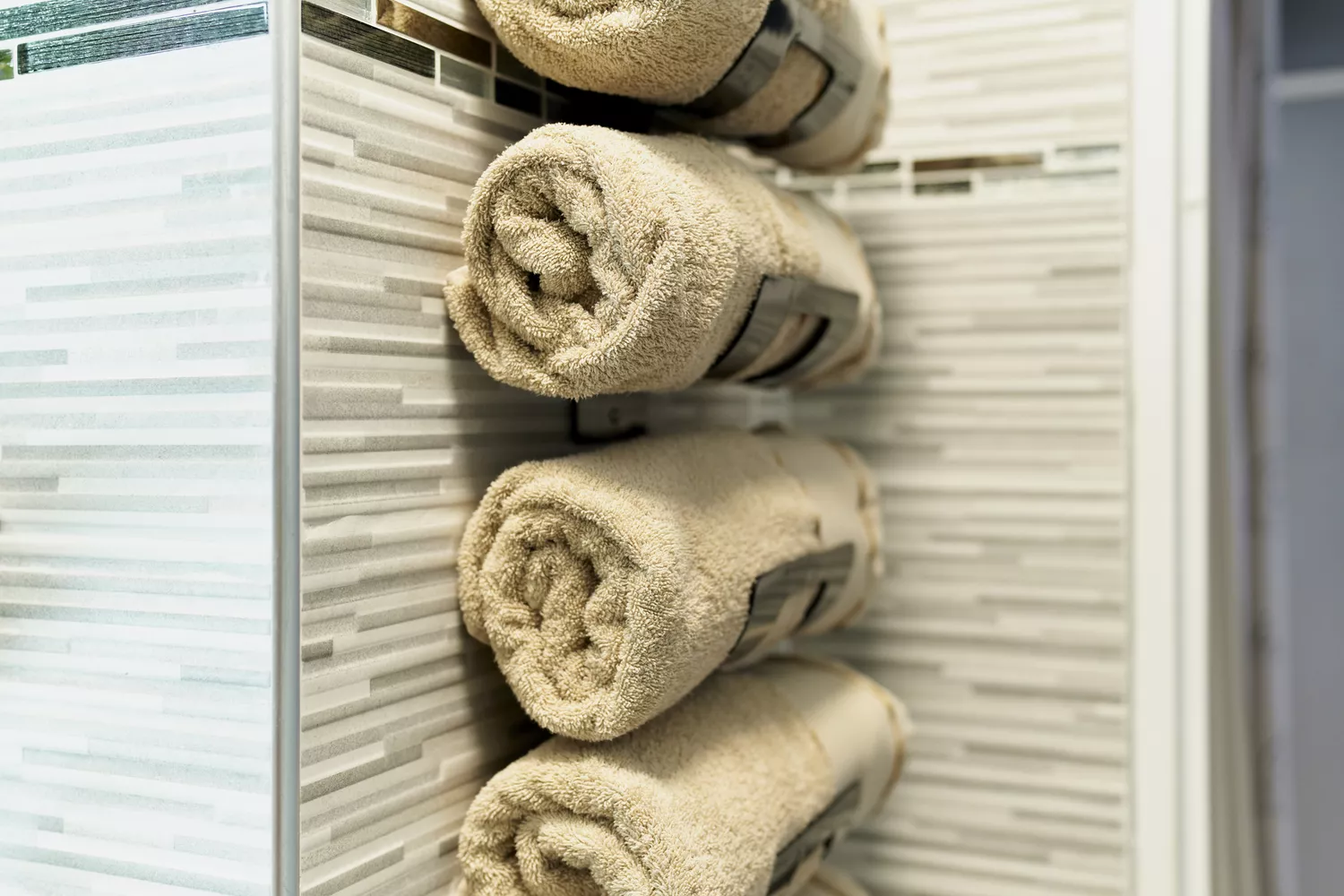 29+ Bathroom Towel Storage Ideas for a Clean and Organized Space 8 Vertical Stainless Steel Wall Rack