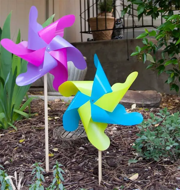 25 DIY Garden Art Sculptures to Add Personality to Your Yard 8 Colorful Plastic Pinwheels