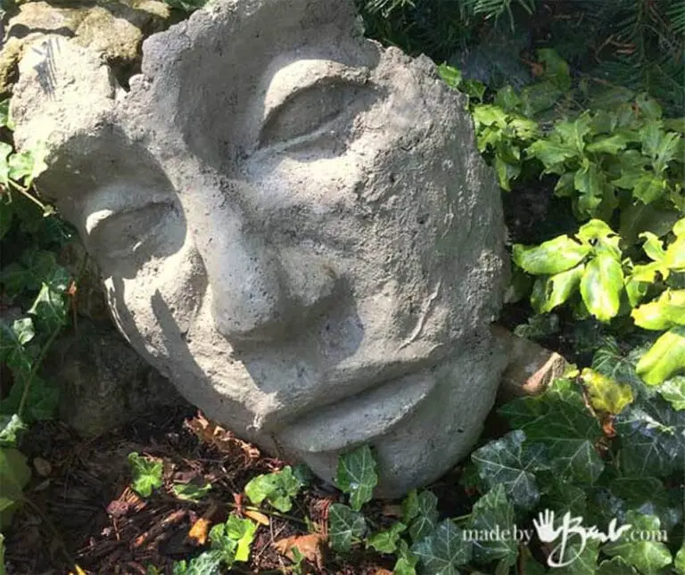 25 DIY Garden Art Sculptures to Add Personality to Your Yard 11 Abstract Concrete Face Sculpture