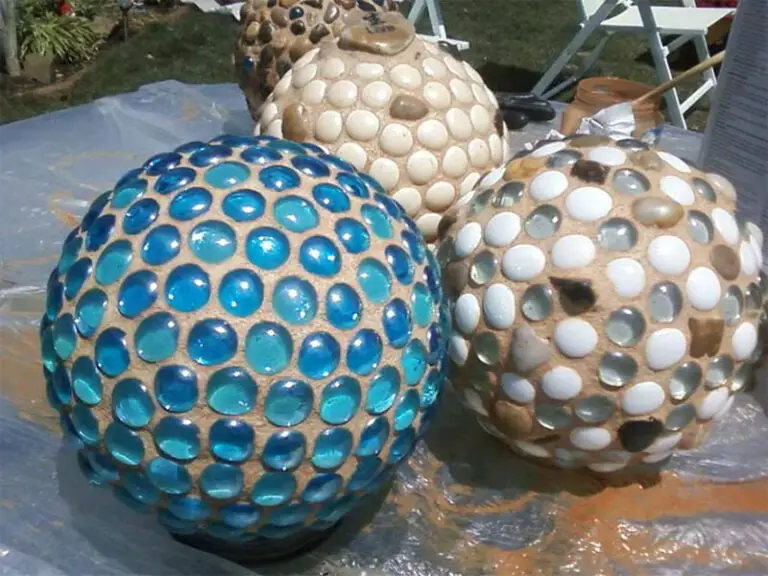 25 DIY Garden Art Sculptures to Add Personality to Your Yard 12 Mosaic Glass Orb Garden Spheres