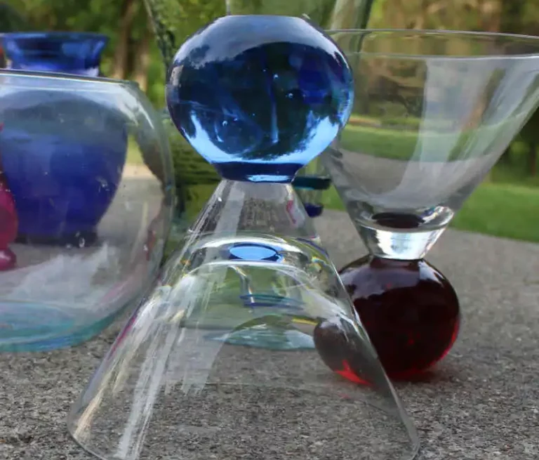 25 DIY Garden Art Sculptures to Add Personality to Your Yard 17 Stacked Glass Goblet Sculpture