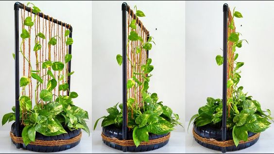 31 DIY Tire Projects That Give Old Tires a Creative New Life 2 DIY Vertical Plant Trellis