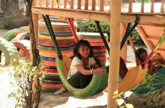 31 DIY Tire Projects That Give Old Tires a Creative New Life 7 DIY Playground Tire Swing Hammock