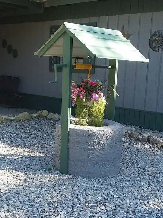 31 DIY Tire Projects That Give Old Tires a Creative New Life 12 DIY Faux Brick Wishing Well Planter