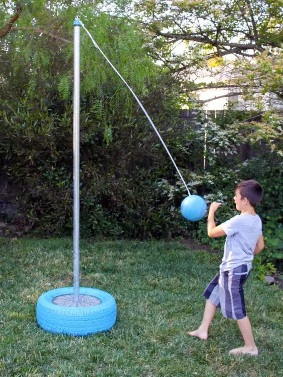 31 DIY Tire Projects That Give Old Tires a Creative New Life 16 DIY Tetherball Game Pole Base