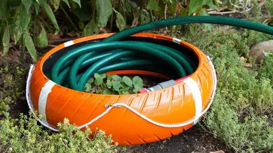 31 DIY Tire Projects That Give Old Tires a Creative New Life 18 DIY Garden Hose Storage Ring
