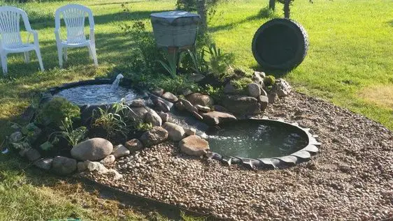 31 DIY Tire Projects That Give Old Tires a Creative New Life 19 DIY Tiered Backyard Water Feature