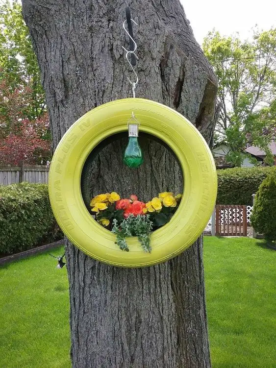 31 DIY Tire Projects That Give Old Tires a Creative New Life 31 DIY Hanging Lighted Tree Planter