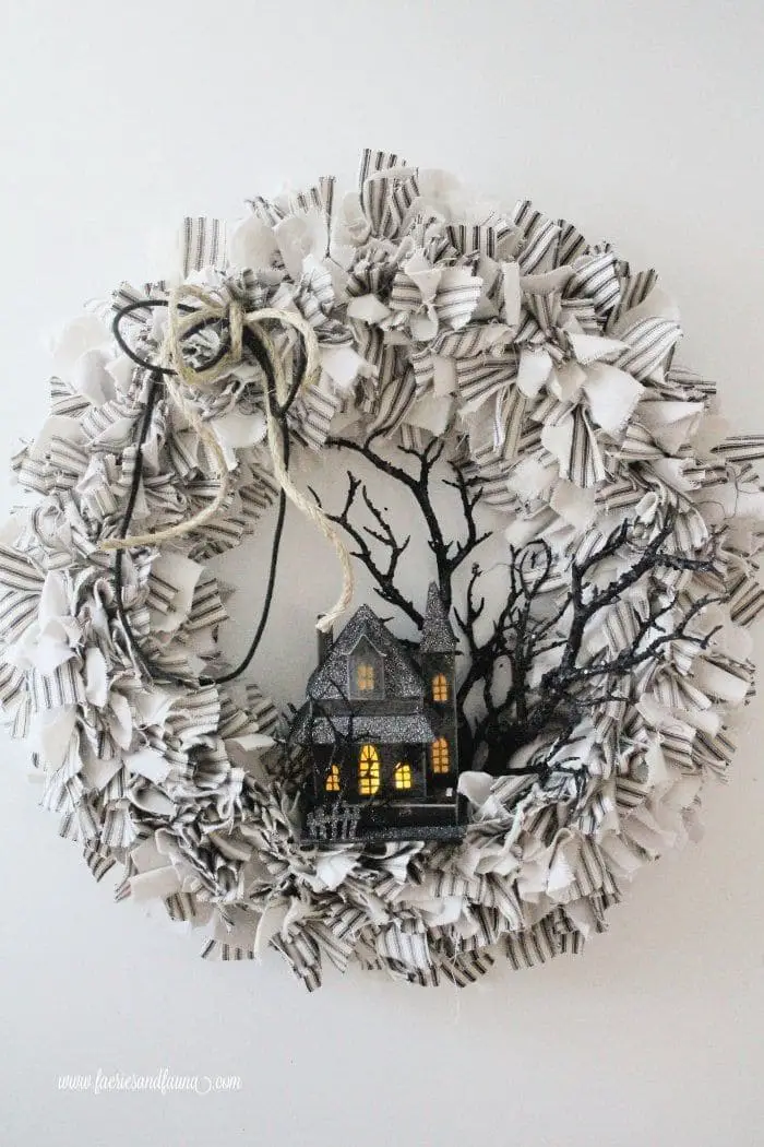 27 Halloween Wreath Ideas to Give Your Front Door a Spooky Touch 8 Rag Wreath with Haunted House