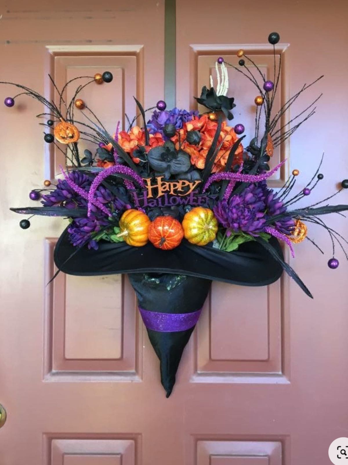 27 Halloween Wreath Ideas to Give Your Front Door a Spooky Touch 20 Floral Witch Hat Door Swag