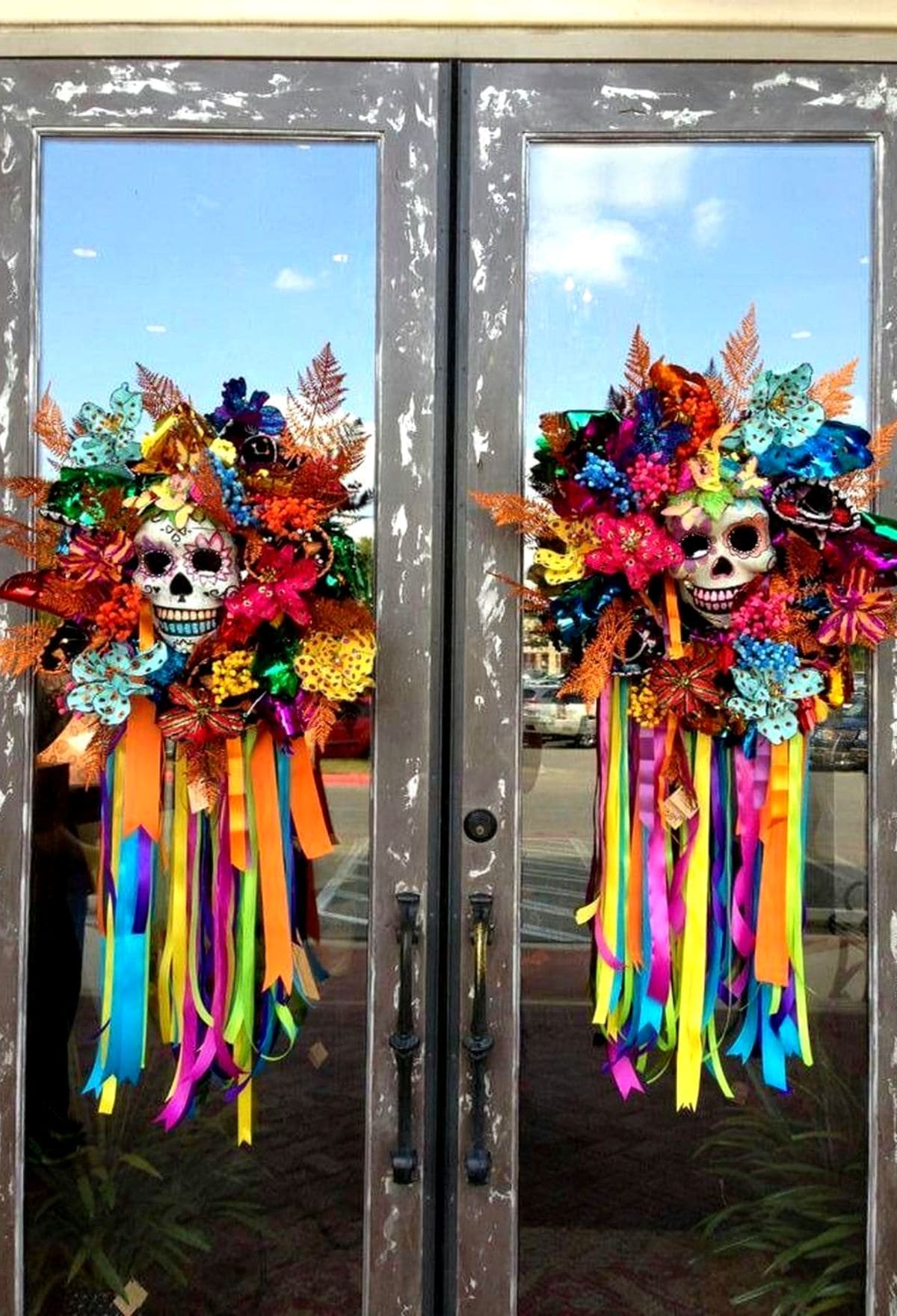 27 Halloween Wreath Ideas to Give Your Front Door a Spooky Touch 23 Day of the Dead Sugar Skull Wreath