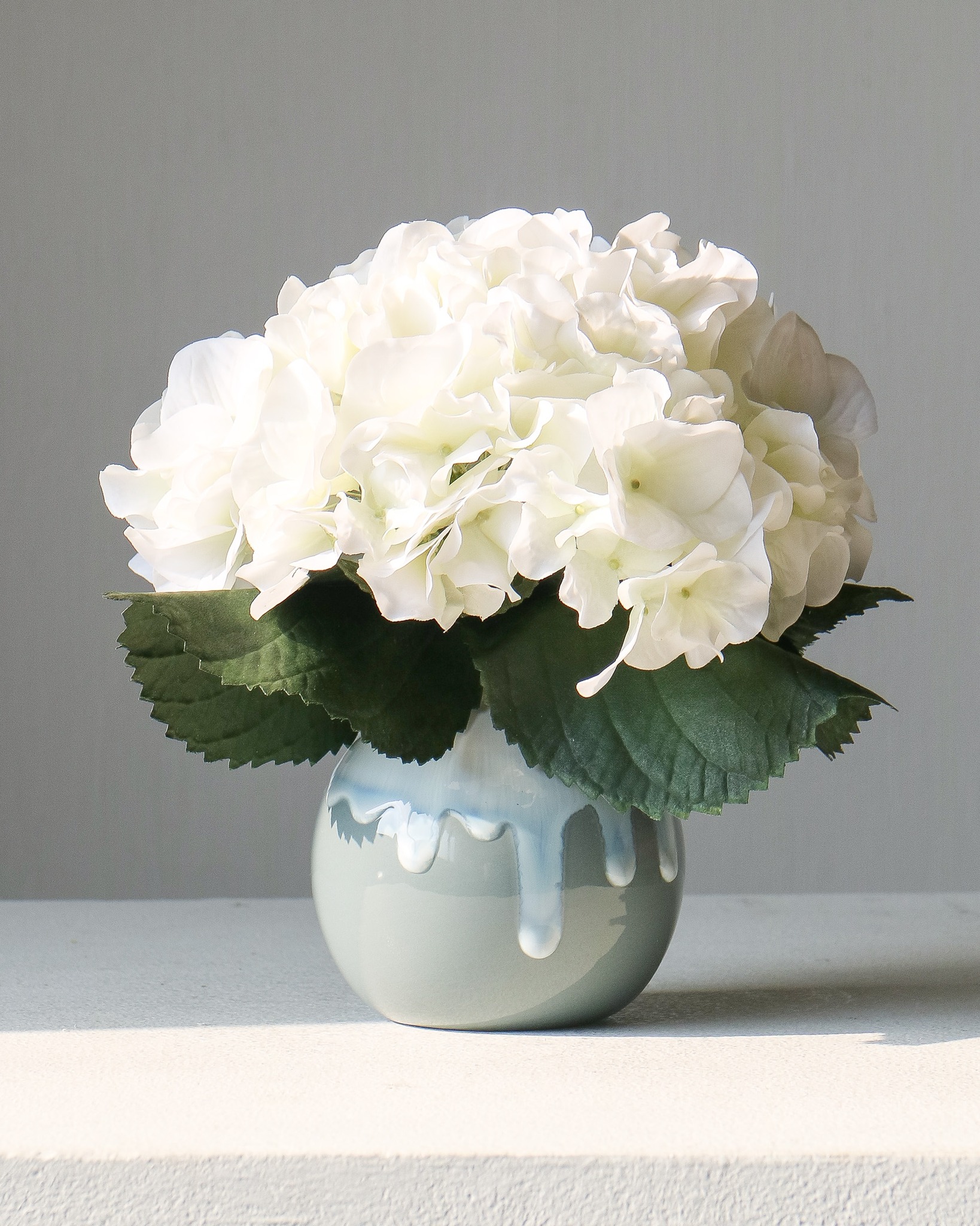 Classic White Hydrangea in Ceramic Drip Vase