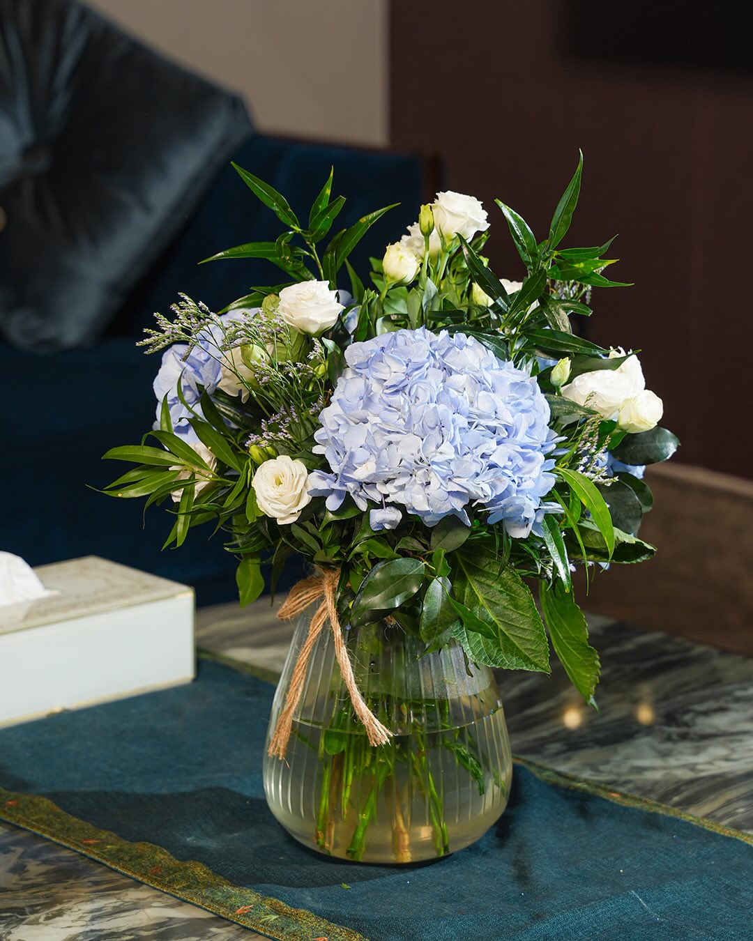 Dusty Blue Arrangement with White Spray Roses