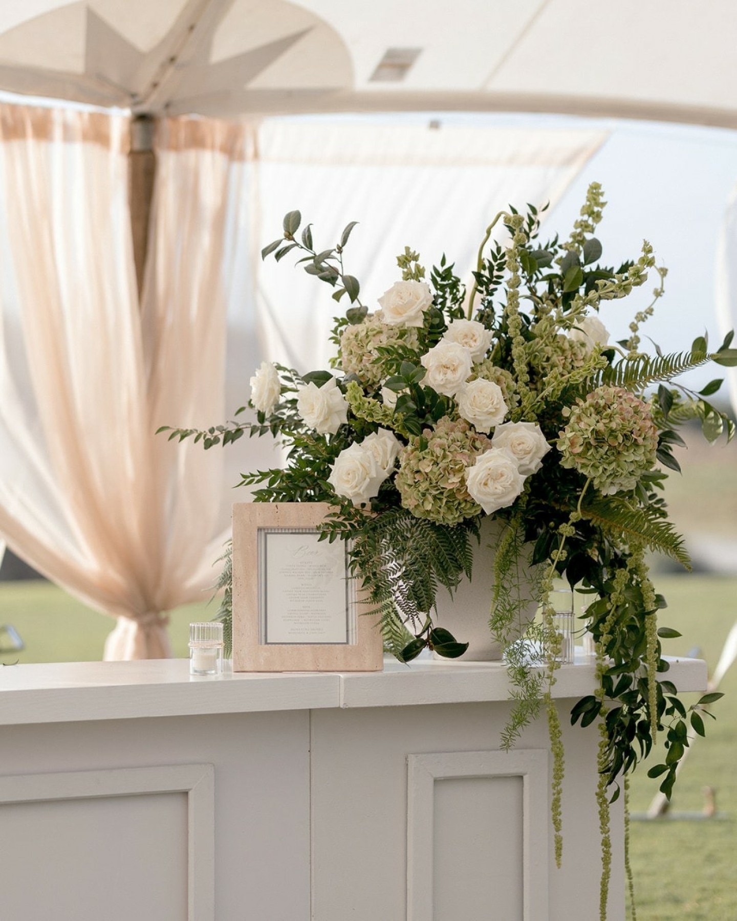Cascading Cream Roses with Wild Fern Foliage