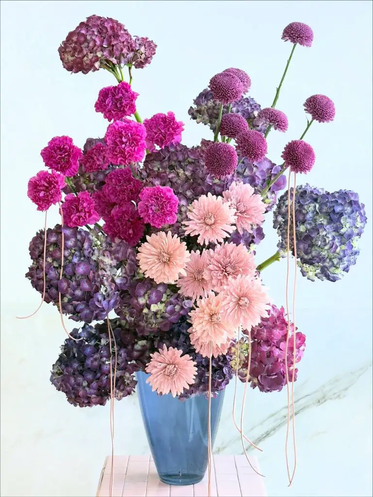 Jewel-Toned Multi-Flower Burst in Blue Glass