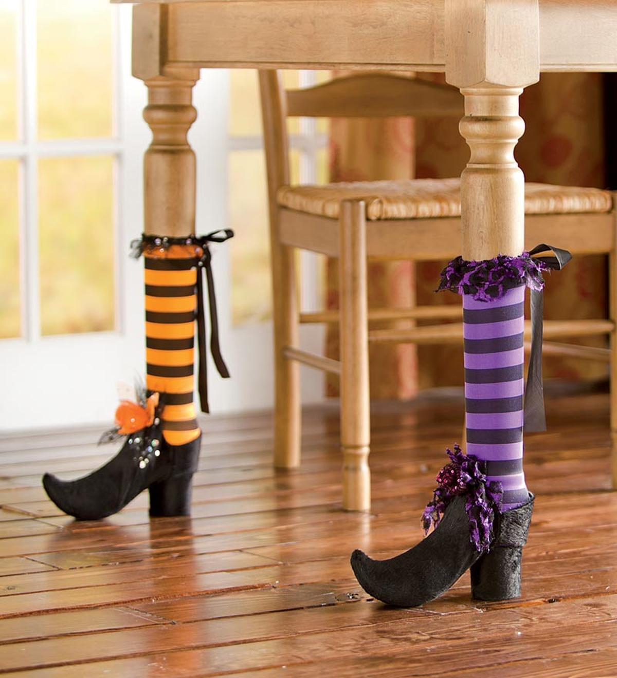 31 Indoor Halloween Decorations Ideas to Make Your Home Spooktacular 3 Witch Leg Table Wraps