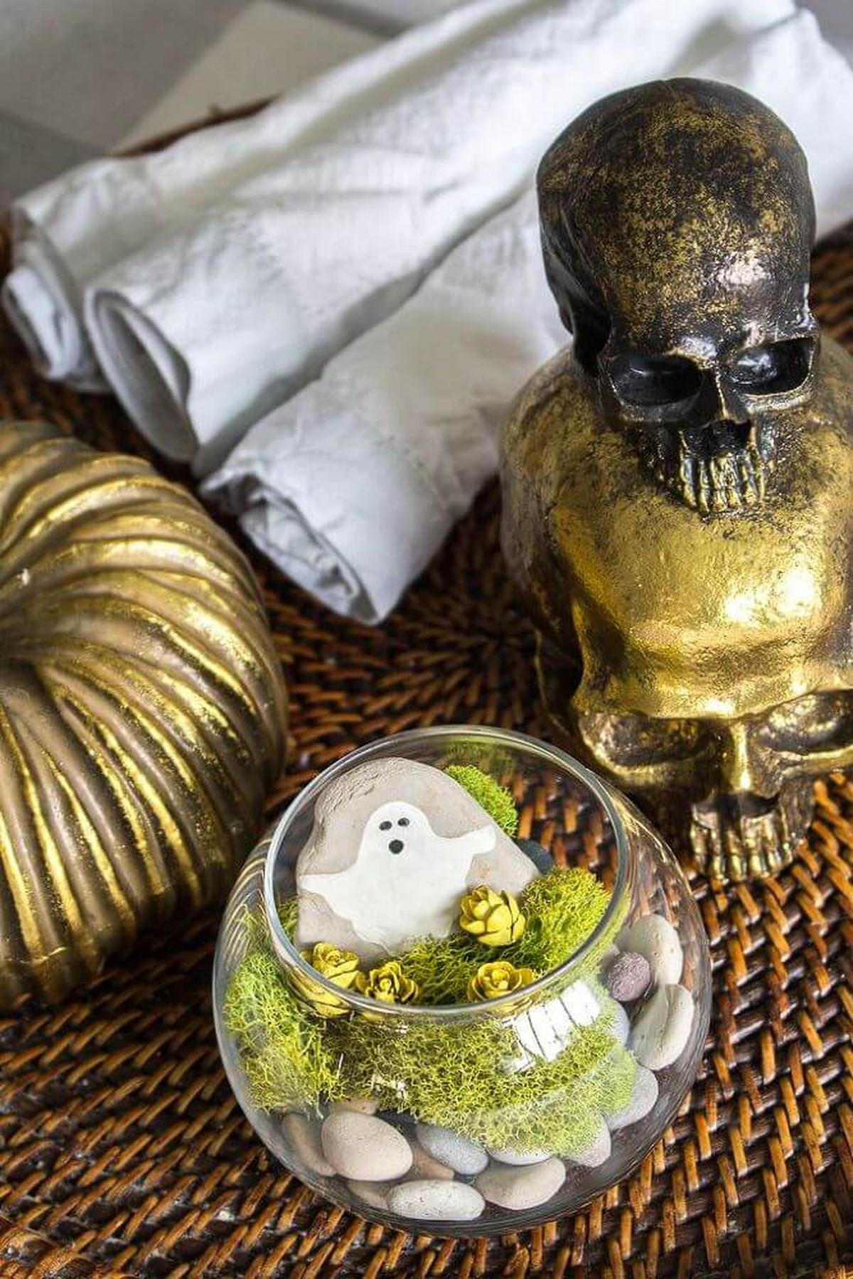 31 Indoor Halloween Decorations Ideas to Make Your Home Spooktacular 7 Mini Ghost Terrarium Accent