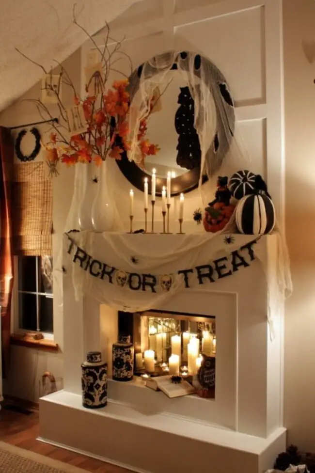31 Indoor Halloween Decorations Ideas to Make Your Home Spooktacular 11 Mantle Piece Spooky Display