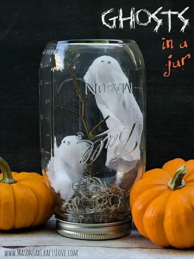 31 Indoor Halloween Decorations Ideas to Make Your Home Spooktacular 19 Ghost in a Mason Jar Terrarium