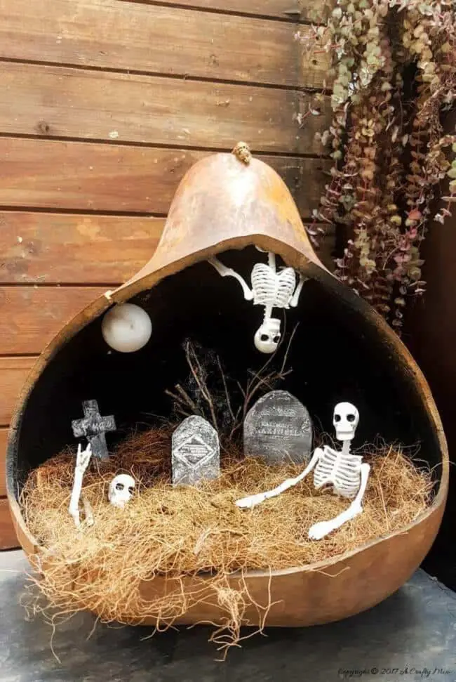 31 Indoor Halloween Decorations Ideas to Make Your Home Spooktacular 21 Dried Gourd Graveyard Diorama