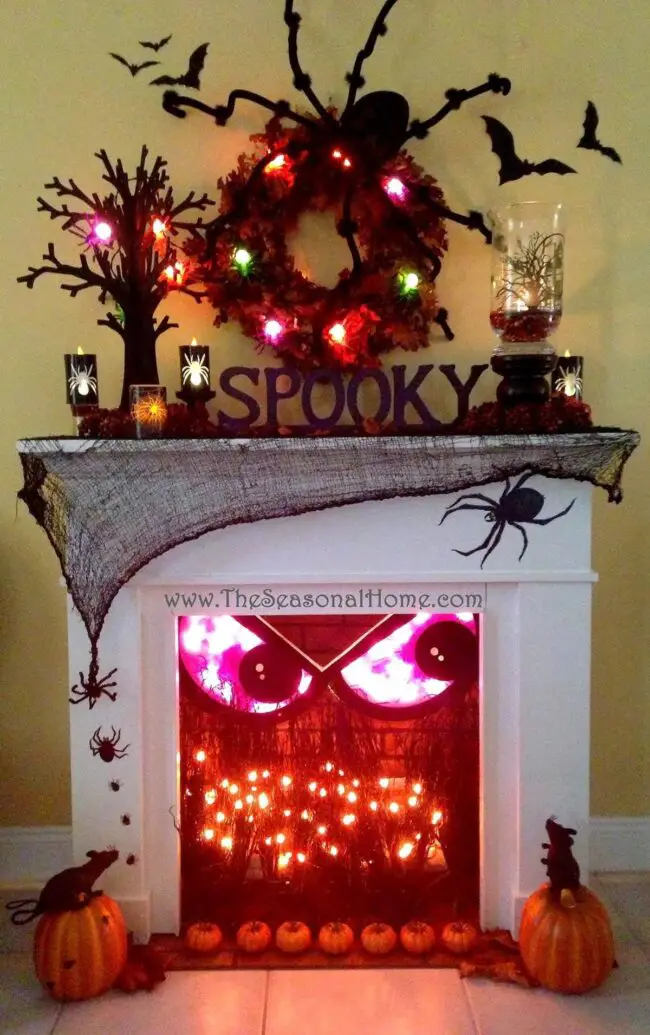 31 Indoor Halloween Decorations Ideas to Make Your Home Spooktacular 25 Glowing Monster Fireplace Insert