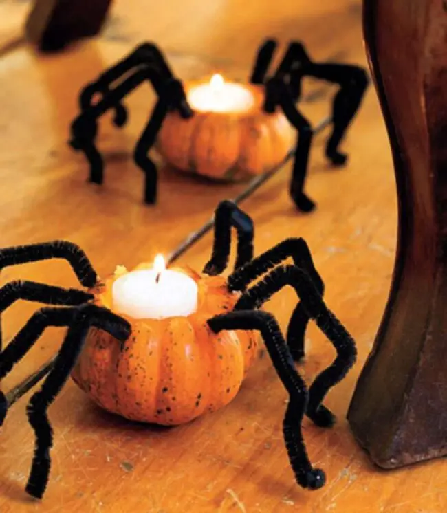 31 Indoor Halloween Decorations Ideas to Make Your Home Spooktacular 26 Mini Pumpkin Spider Votives