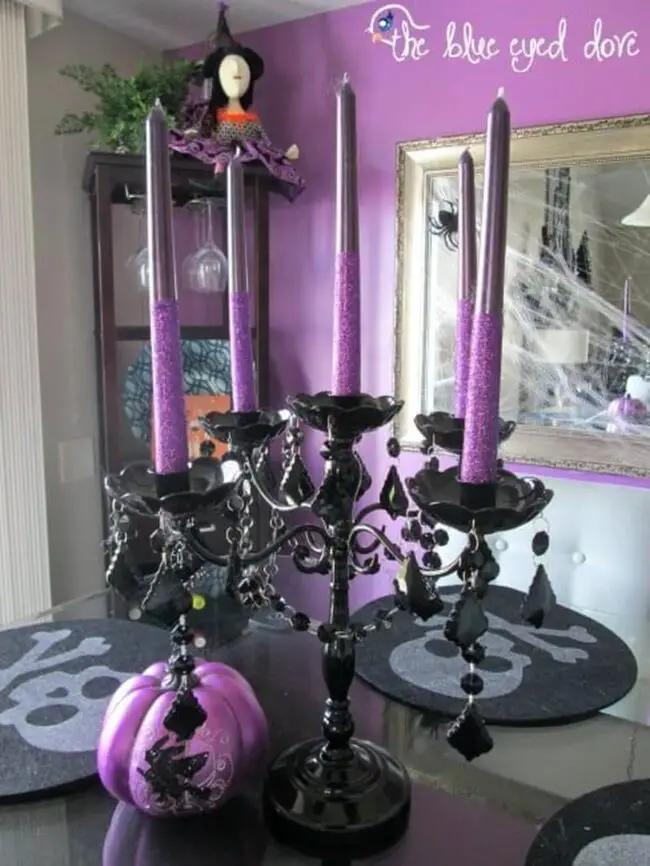 31 Indoor Halloween Decorations Ideas to Make Your Home Spooktacular 27 Gothic Purple Candelabra