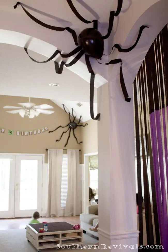 31 Indoor Halloween Decorations Ideas to Make Your Home Spooktacular 32 Giant Balloon Crepe Paper Spiders