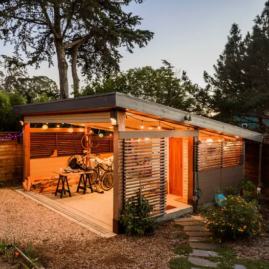 31 Tiny Shed House Ideas for Small and Creative Living Spaces 7 Open Air Covered Storage and Workspace Shed