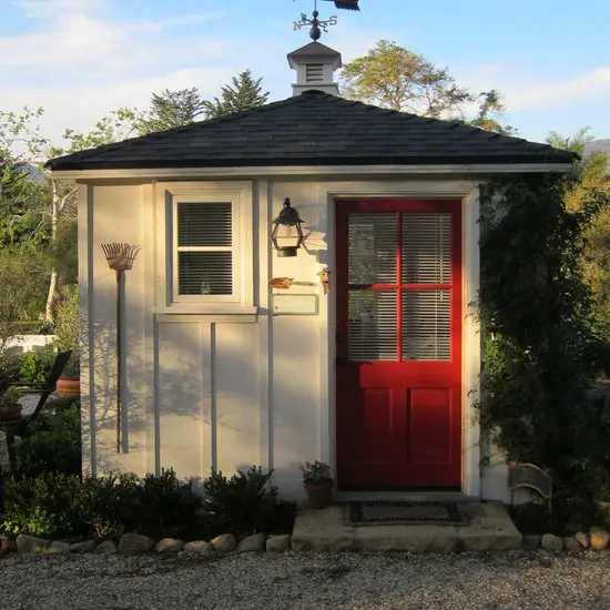 31 Tiny Shed House Ideas for Small and Creative Living Spaces 11 Classic White Garden Cottage Shed