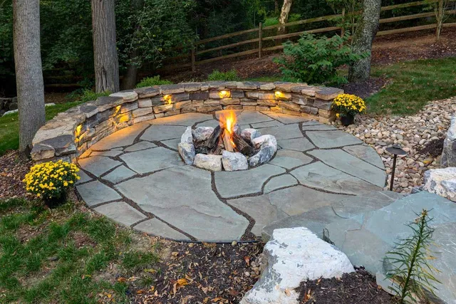 Sunken Flagstone Fire Pit Patio with Stone Retaining Seat Wall
