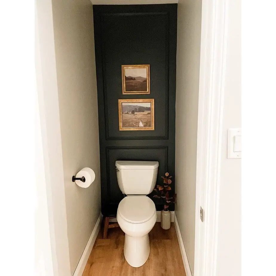 25 Small Toilet Room Ideas to Make a Tiny Space Feel Stylish 7 Moody Charcoal Feature Wall with Gold Framed Art
