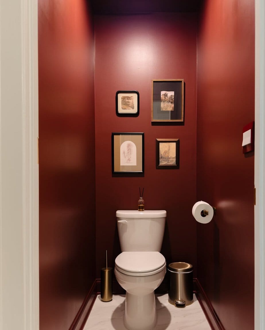 25 Small Toilet Room Ideas to Make a Tiny Space Feel Stylish 8 Rich Burgundy Accent Room with Brass Details