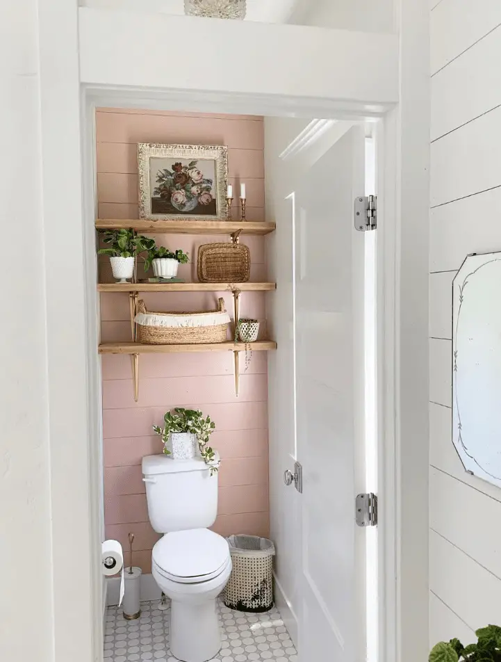 25 Small Toilet Room Ideas to Make a Tiny Space Feel Stylish 16 Dusty Pink Shiplap with Floating Wooden Shelves