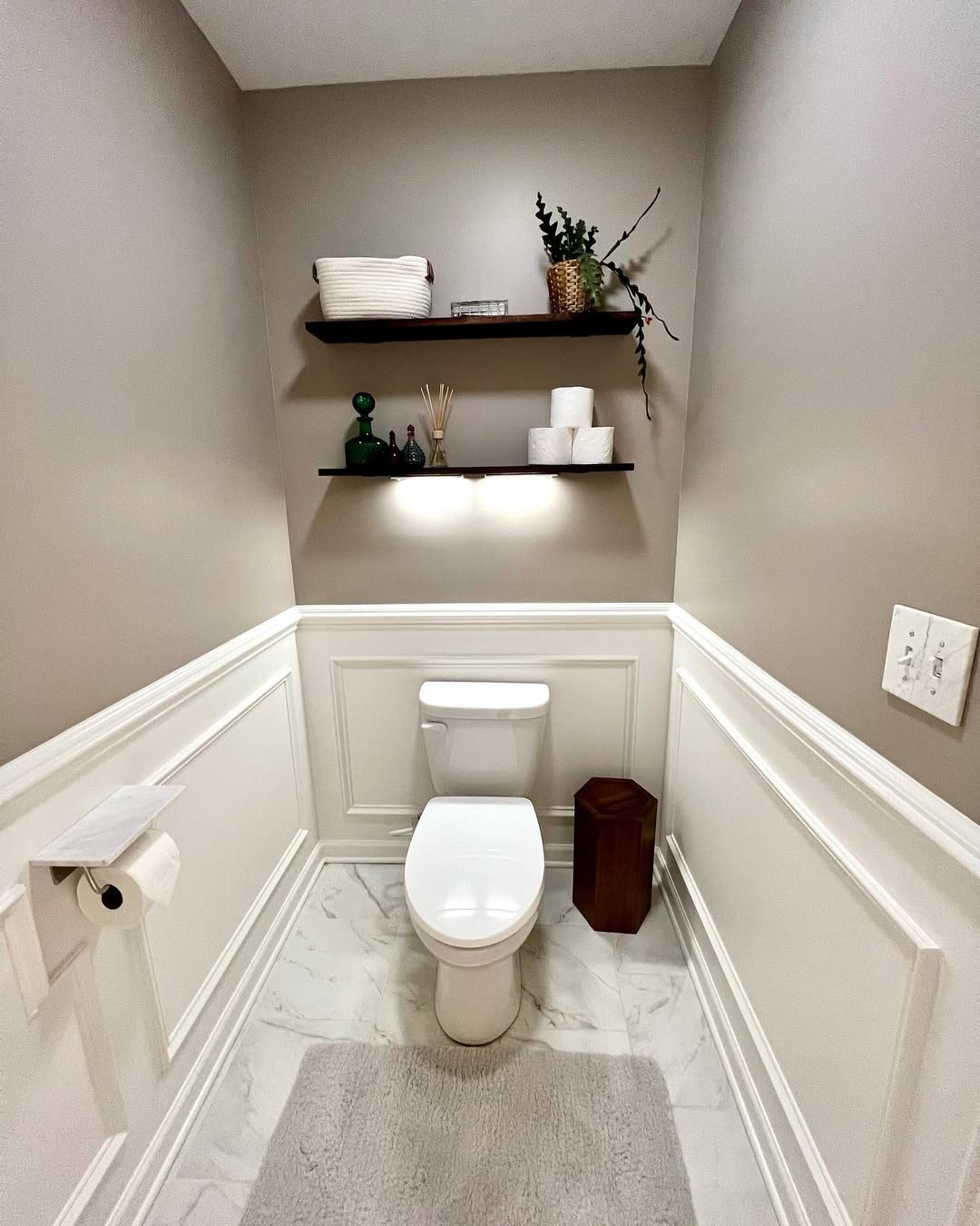 25 Small Toilet Room Ideas to Make a Tiny Space Feel Stylish 17 Soft Taupe Walls with Integrated Shelf Lighting