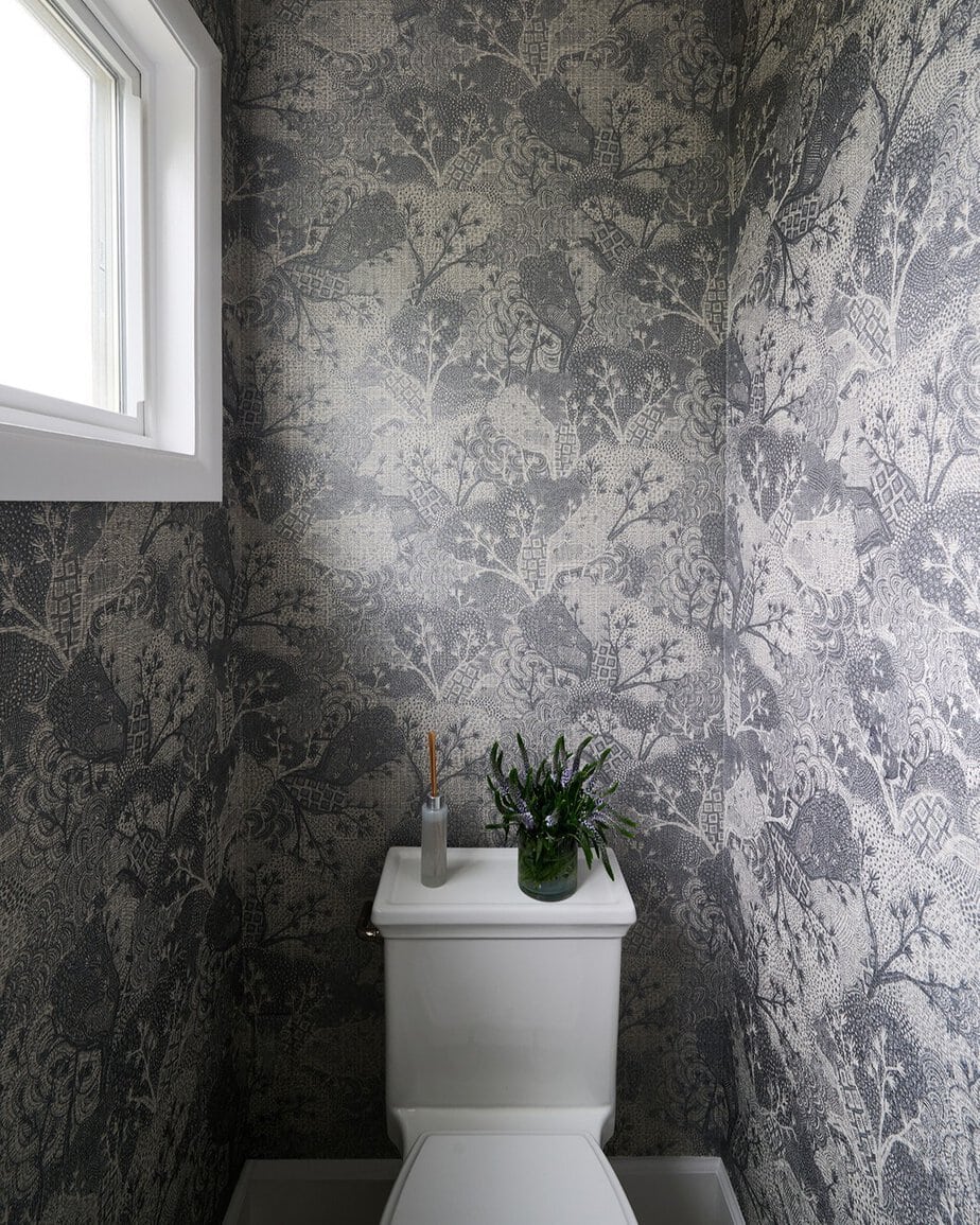 25 Small Toilet Room Ideas to Make a Tiny Space Feel Stylish 18 Monochromatic Woodland Patterned Wallpaper