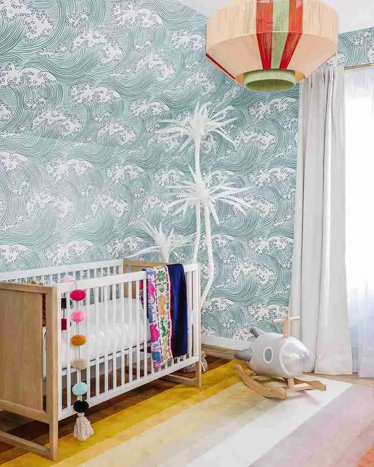 25 Toddler Boy Bedroom Ideas for a Fun and Functional Space 6 Wave Pattern Wallpaper with Wooden Crib