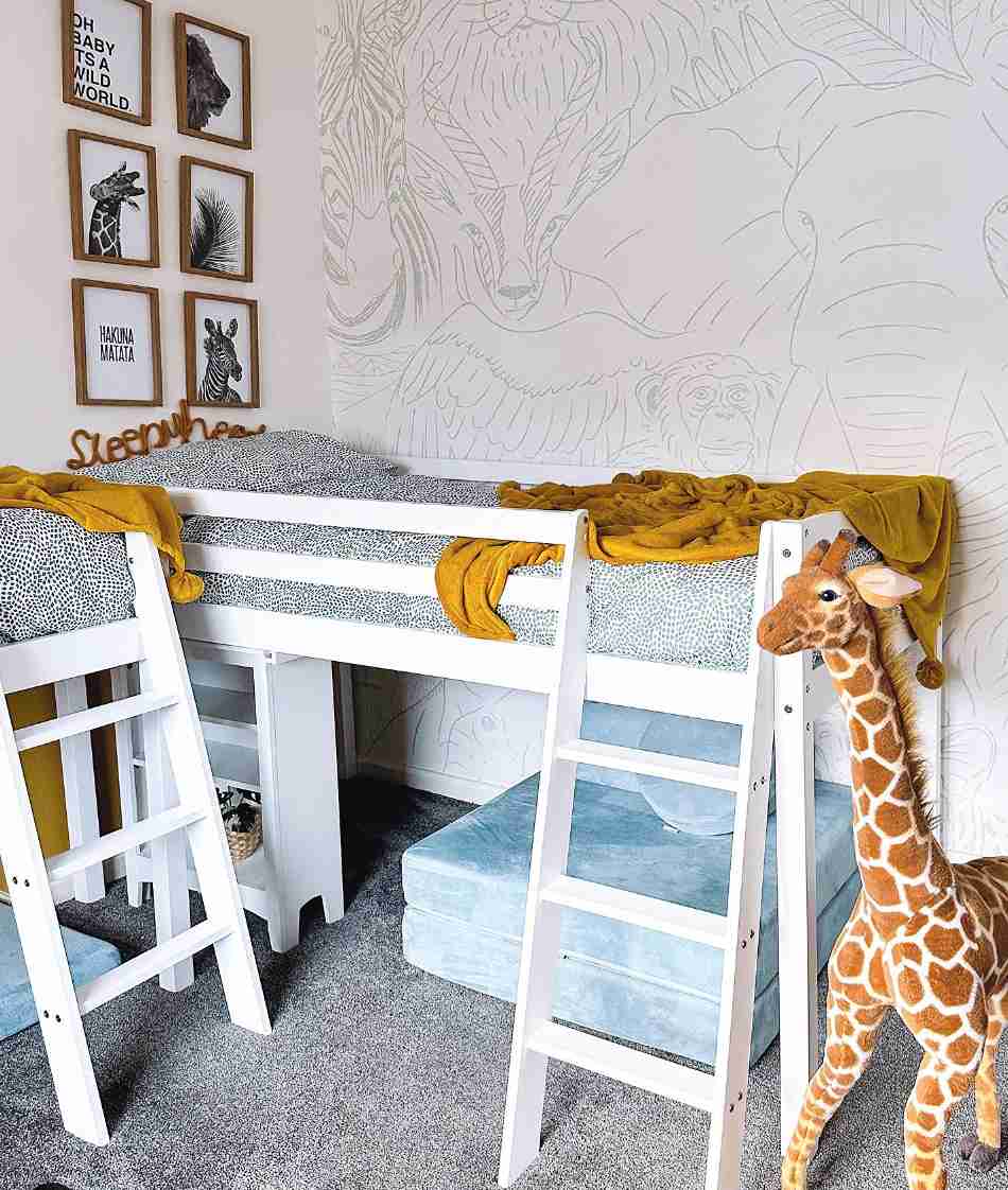 25 Toddler Boy Bedroom Ideas for a Fun and Functional Space 13 Wildlife Mural with Low Wooden Loft Bed