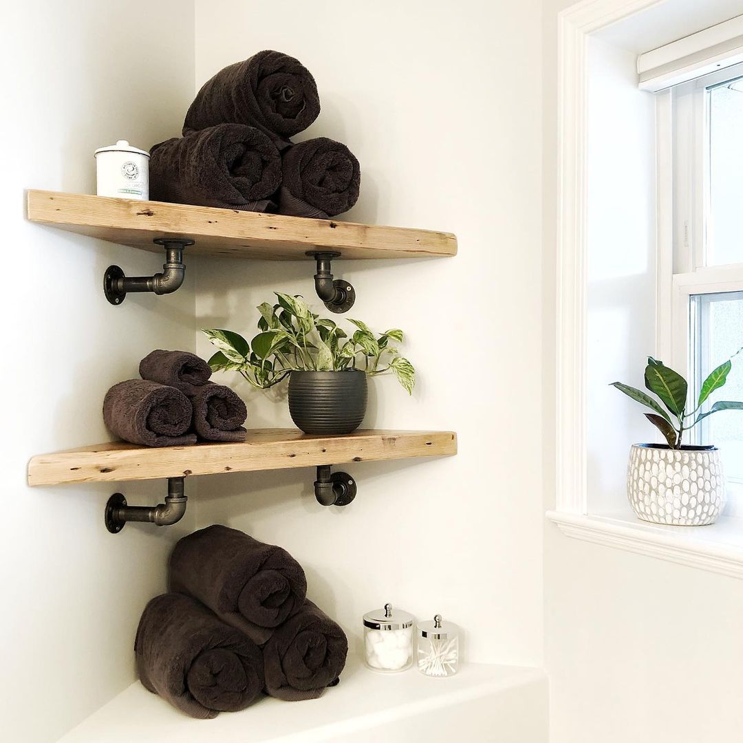 Corner Floating Shelves with Metal Pipes
