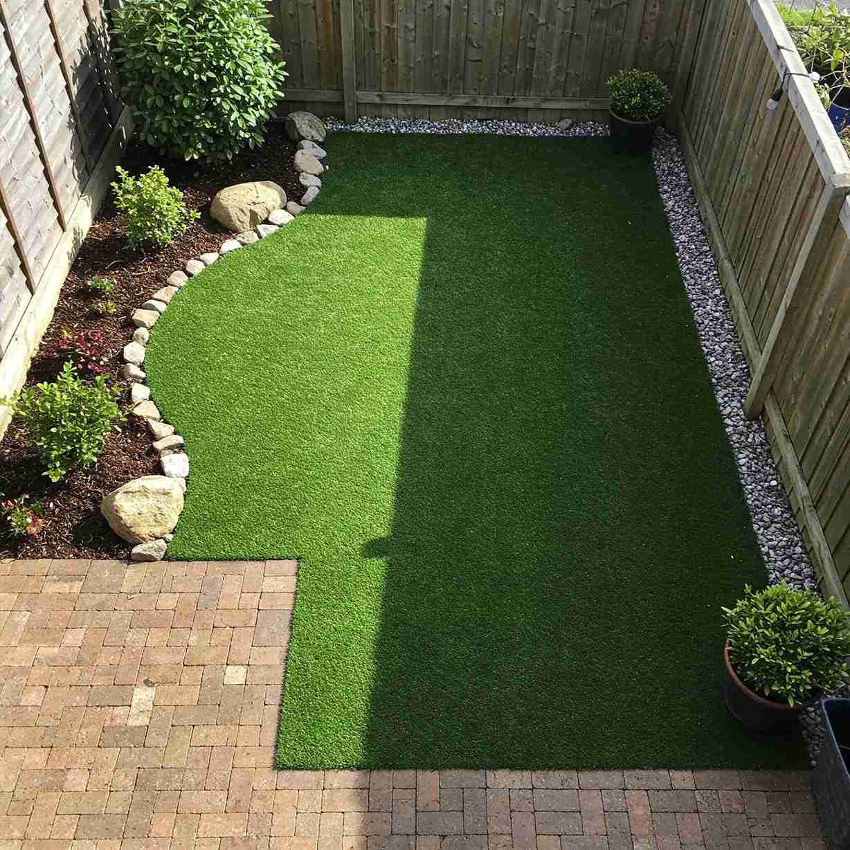 17+ Turf Backyard Ideas That Look Beautiful and Low-Maintenance 6 Clover Meadow Turf with Garden Trellis