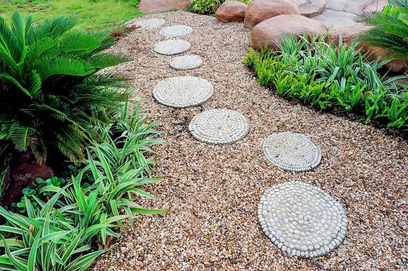 Gravel Pathway with Pebble Mosaic Stepping Stones